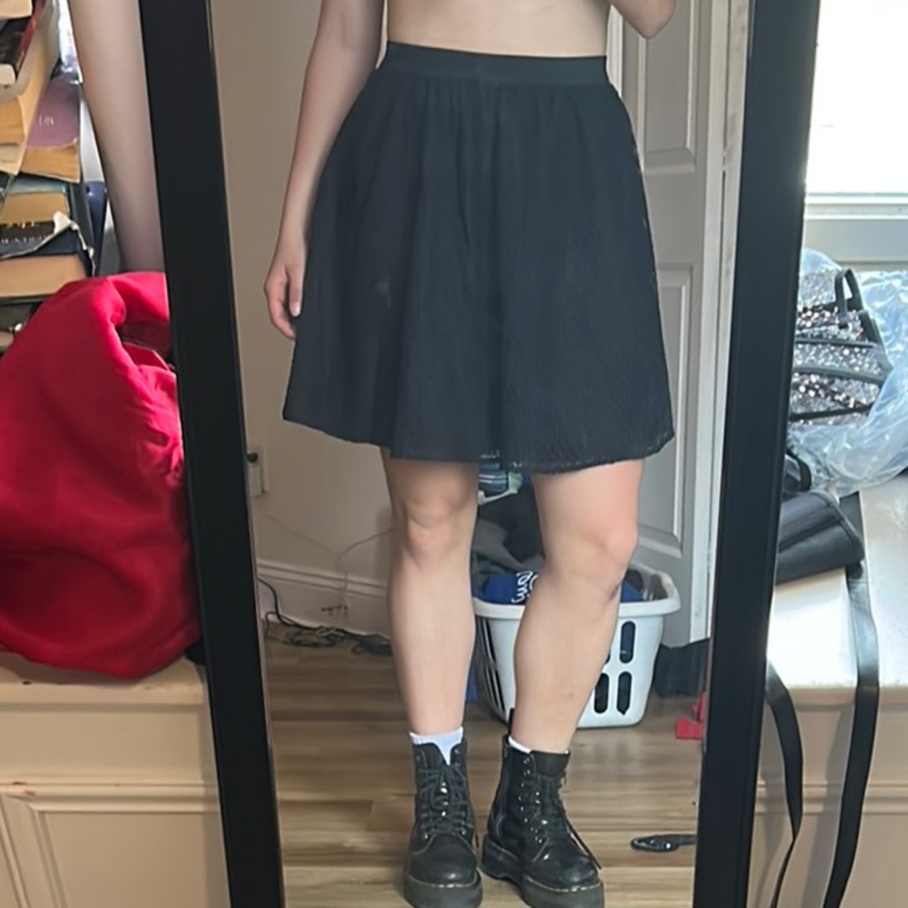 Black Juicy Couture skirt with polkadot mesh pattern